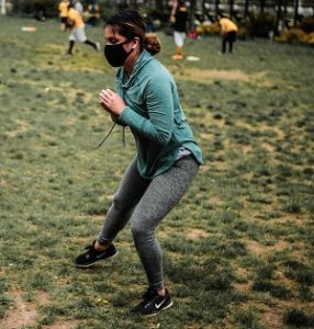Young woman participating in Fitness Bootcamp with Judy